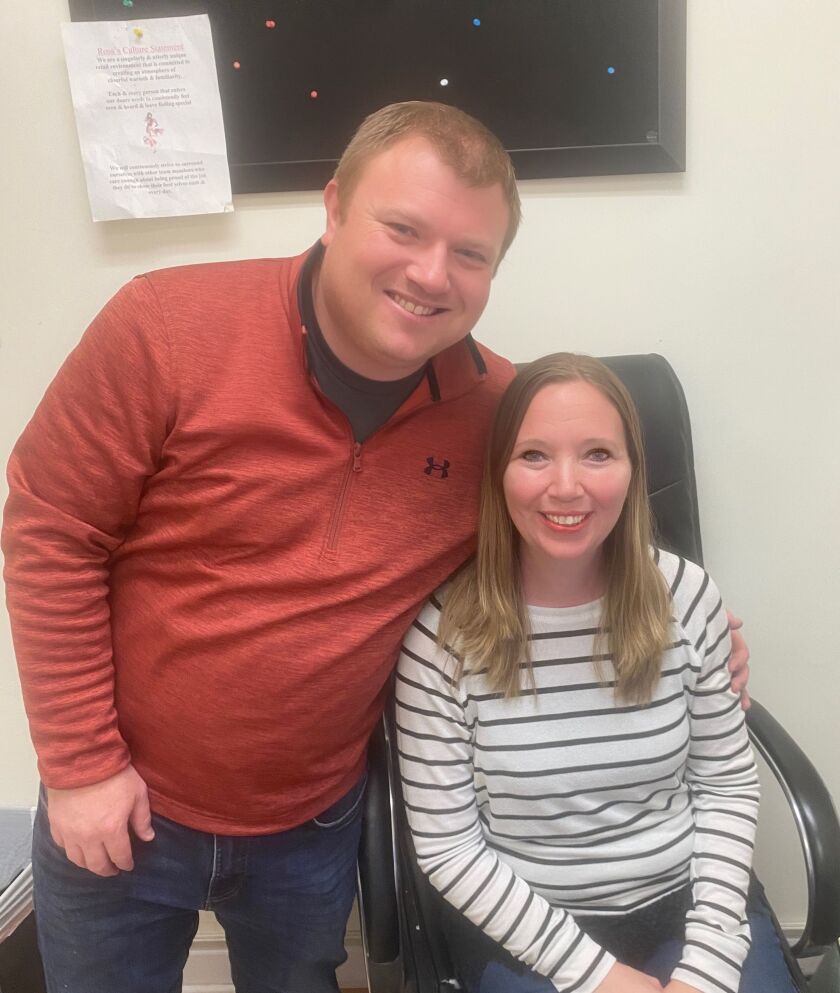 Matt and Regina Chesney, who bought Rose Cosmetics, on the first day of their ownership.