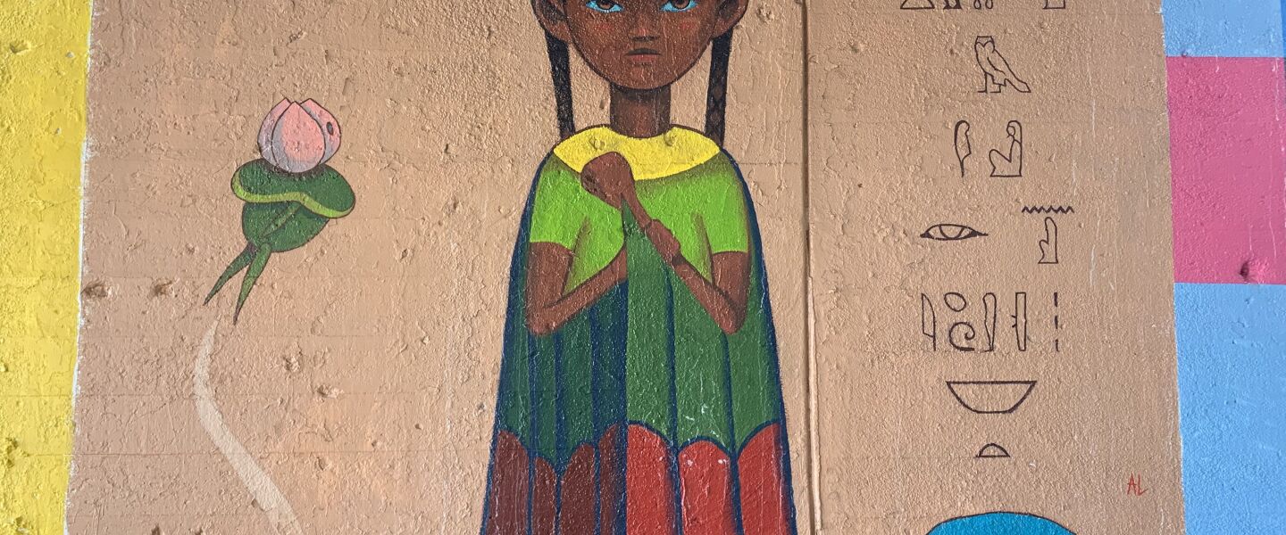 This mural, by a Southeast Side artist who goes by Asteroid Lloyd, features a girl he says is “all for justice. She’s from Chicago. She’s a character on the quest for knowledge and finding herself.” Hieroglyphics also are part of this painting, as are a lotus flower and a frog.