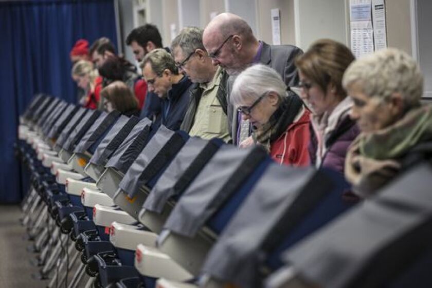 Early voters cast their ballots at 175 W. Washington St. Monday, October 29, 2018. | Rich Hein/Sun-Times