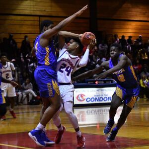 Curie’s Justin Harmon (24) tries to get off a shot. Worsom Robinson/For the Sun-Times.
