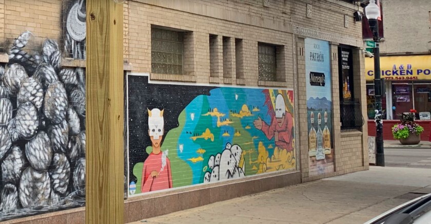 This mural by Jay Jasso on an outside wall at Moreno’s Liquors is among several works of public art at 26th Street and Ridgeway Avenue in Little Village.