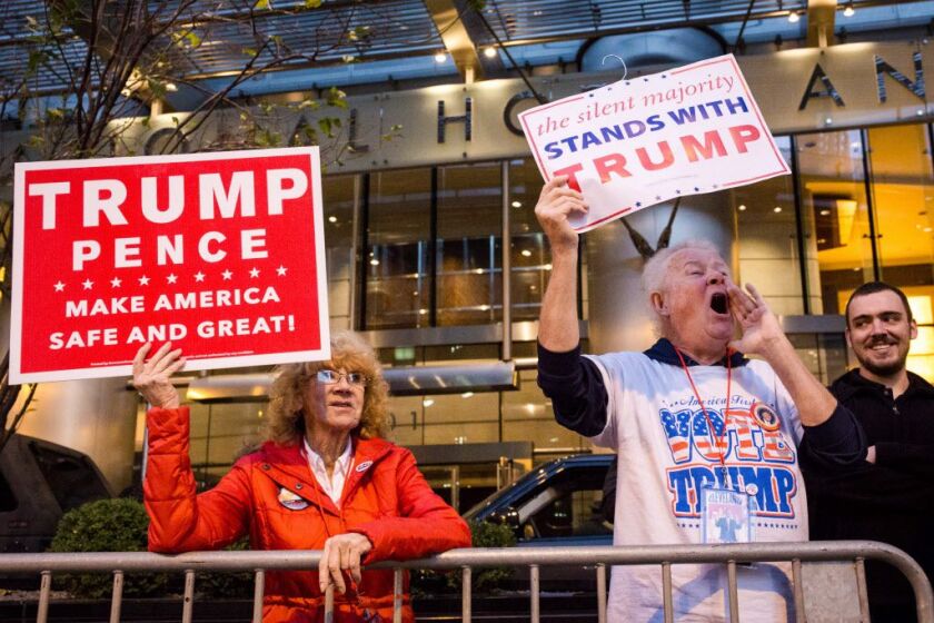 Donald Trump supporters Don and Virginia Petterson, among others, also gathered outside Trump International Hotel and Tower in Chicago on Nov. 9, 2016. | Santiago Covarrubias/Sun-Times