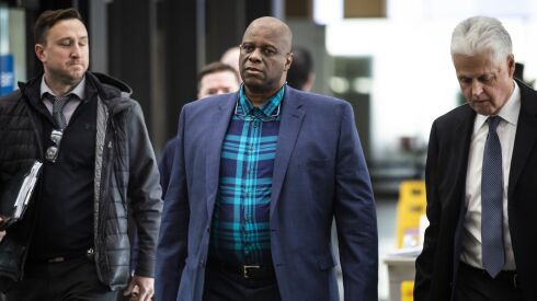 Chicago Police Officer Lowell Houser walks into the Leighton Criminal Courthouse on Friday morning, Dec. 20, 2019.