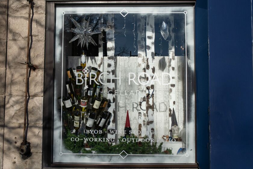 A Christmas tree made of wine bottles adorns Birch Road Cellar’s window, located at 2002 W. Roscoe St.