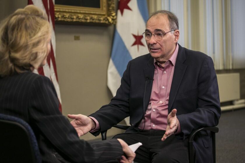 David Axelrod talks with Sun-Times reporter Fran Spielman at City Hall Friday, Dec. 7, 2018. | Rich Hein/Sun-Times