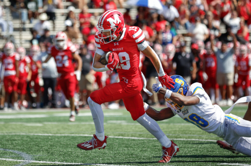 Fleming brothers help lift marist past visiting simeon 2026 - юстиция Marist's conor fleming carries the ball for a touchdown despite the best efforts of simeon's darryl mitchell.