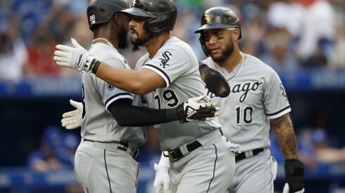 (From left) Luis Robert, Jose Abreu, Yoan Moncada. (Getty Images)