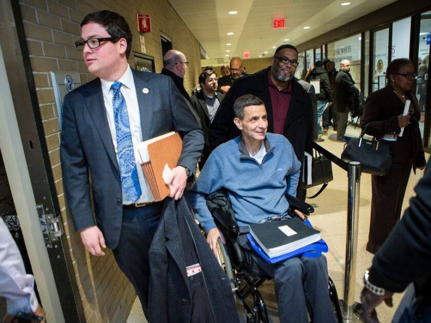 Aldermen Nicholas Sposato and Howard Brookins Jr. wait in line on the first day of the filing period for Municipal Elections, Monday, November 19th, 2018. | James Foster/For the Sun-Times