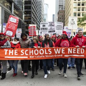 Chicago Teachers Union Vice President Stacy Davis Gates (center), other union officials and their supporters lead thousands of striking union members on a march through the Loop, Thursday afternoon, Oct. 17, 2019.