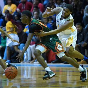 Simeon’s Jeremiah Stamps (15) tries to rip the ball away from Morgan Park’s Marcus Watson Jr. (22), Thursday 01-24-19. Worsom Robinson/For the Sun-Times.