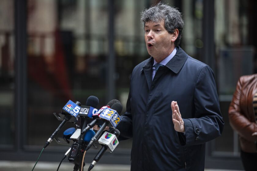 Ald. Brian Hopkins (2nd) speaks of complaints he has received from residents regarding the lack of mail during a news conference Sunday, Feb. 28, 2021, at Federal Plaza in the Loop.