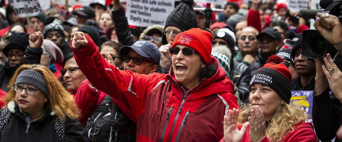 Thousands of striking Chicago Teachers Union and SEIU Local 73 members and their supporters rally at the Thompson Center after marching around City Hall during Mayor Lori Lightfoot’s first budget address during the monthly Chicago City Council meeting.