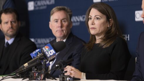 Wendy Cook speaks about the night of the incident during a press conference about the filing of a lawsuit against the truck driver that crashed into a school bus, Tuesday, November 29, 2022.