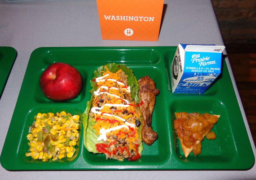 The meal designed by four high school students served Wednesday in CPS features a Cajun chicken lettuce wrap, corn relish and apricot and yogurt pizza. | Provided photo