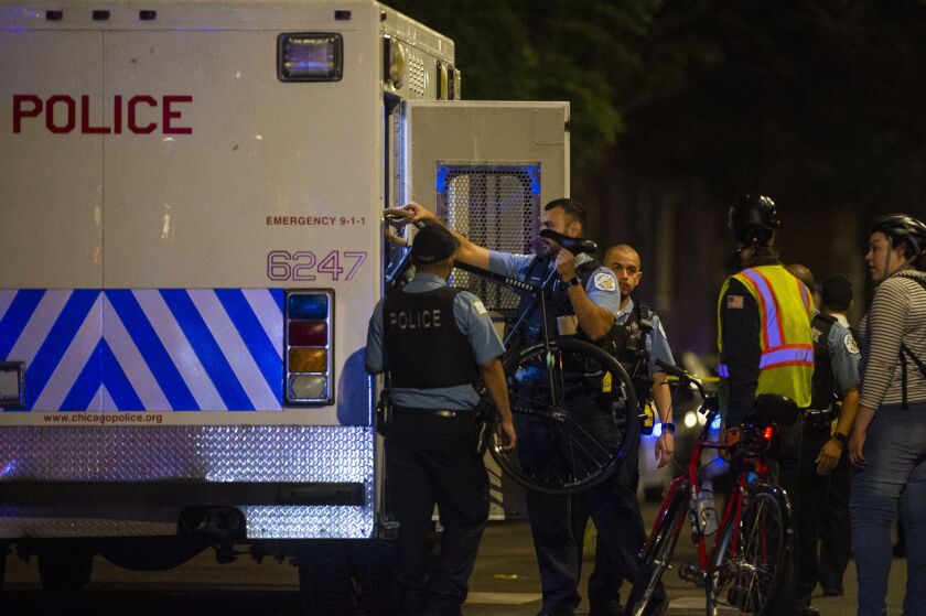 Police investigate a person shot Tuesday morning in the 600 block of East 76th. | Tyler LaRiviere/Sun-Times
