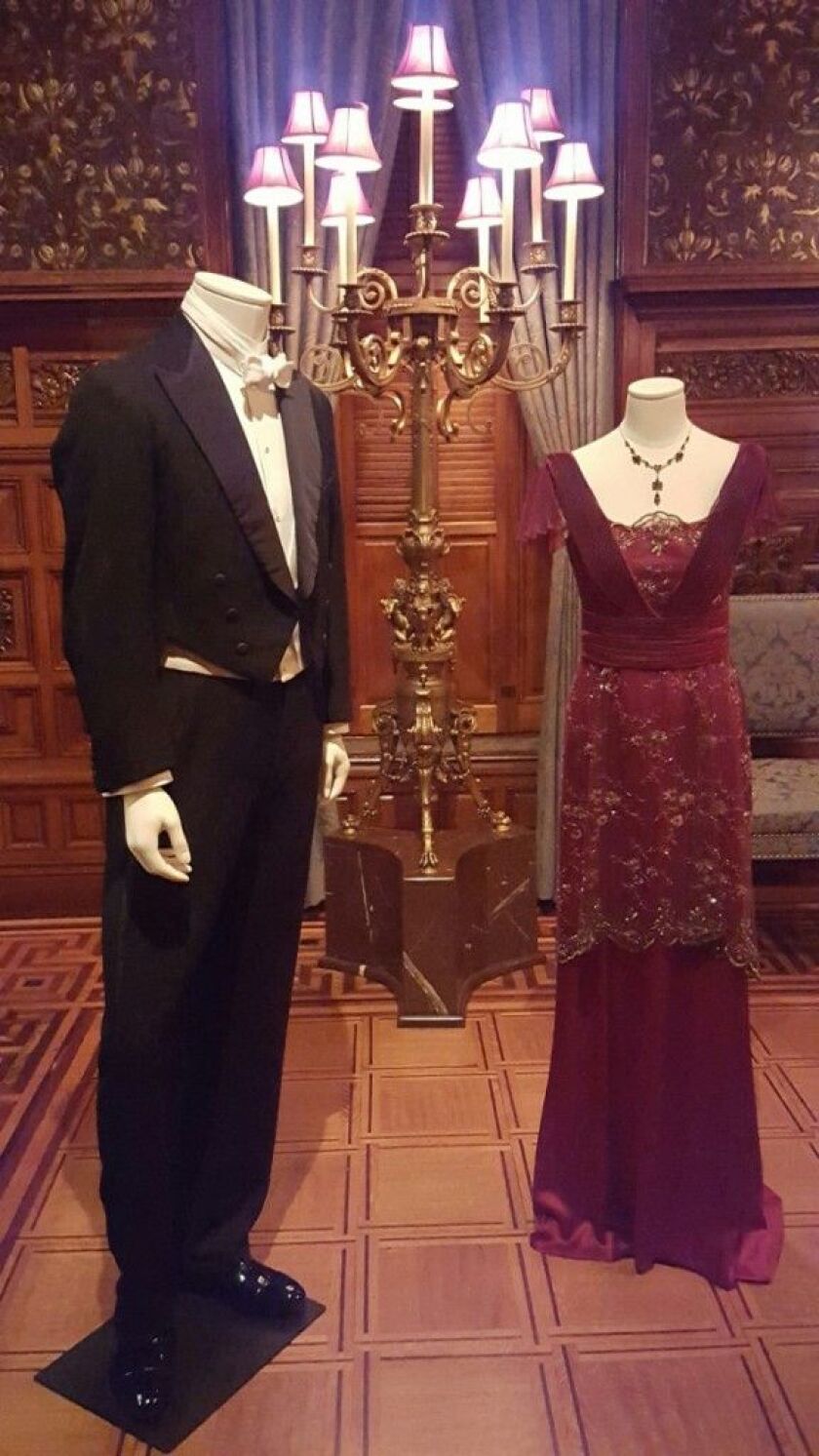 Lady Mary (Michelle Dockery) and Matthew Crawley (Dan Stevens), Downton Abbey, season 1. Evening dress worn at dinner on the occasion when the Turkish diplomat appears with Mr. Napier and Matthew Crawley. The dress was made for the show from a turn-of-the