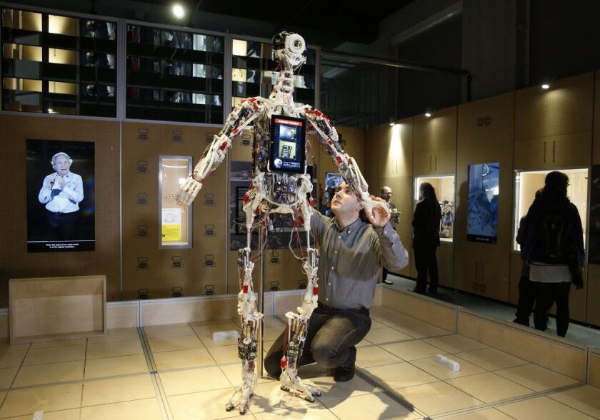 A technician adjusts Rob’s Open Source Android (ROSAL) which was built in France from 2010-2016, at the Science Museum in London, Tuesday, Feb. 7, 2017. The exhibition shows 500 years of mechanical and robotic advances.(AP Photo/Alastair Grant)