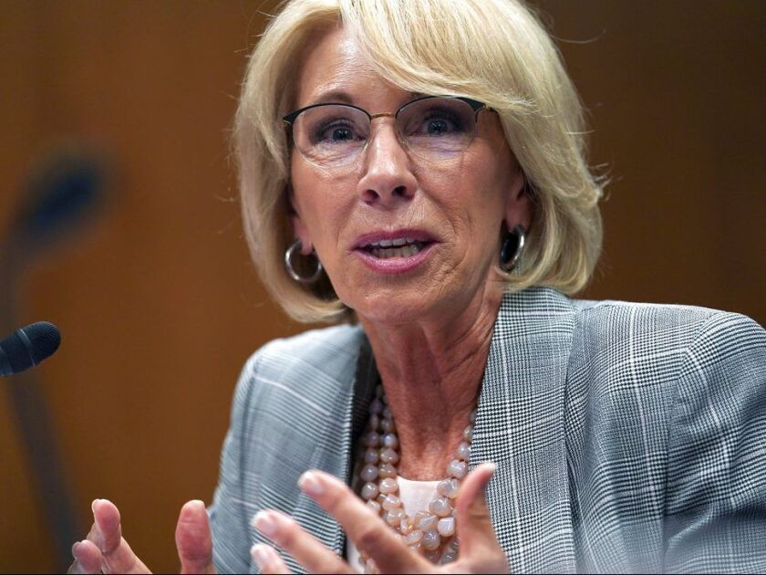 Education Secretary Betsy DeVos is working dismantle Obama-era regulations designed to better police the for-profit industry and increase protections for students. | AP file photo