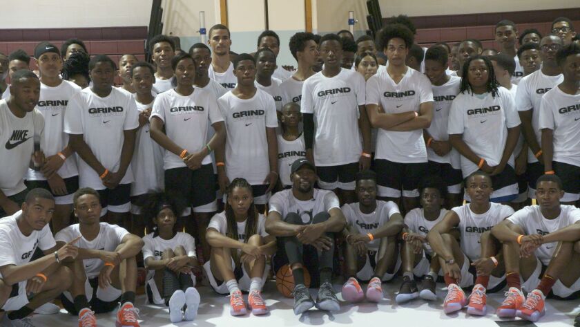 Kevin Durant surprised youth basketball players at Kenwood High on Thursday.