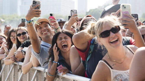 Mariah the Scientist fans react while watching her perform on the fourth day of Lollapalooza at Grant Park, Sunday, Aug. 3, 2025.