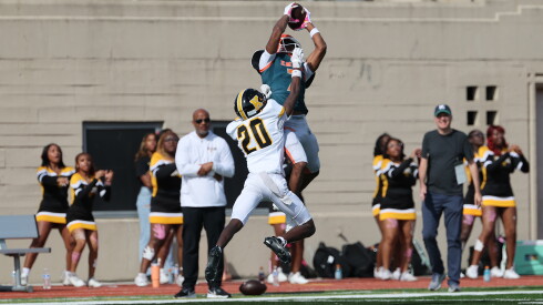 Morgan Park's Jeremiah Harvey (7) catches a pass for a big gain in the first half against King.