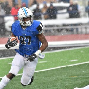 Tyler Nubin of St. Charles North makes a way to find a first down. Saturday 11-17-18 Worsom Robinson/For the Sun-Times.