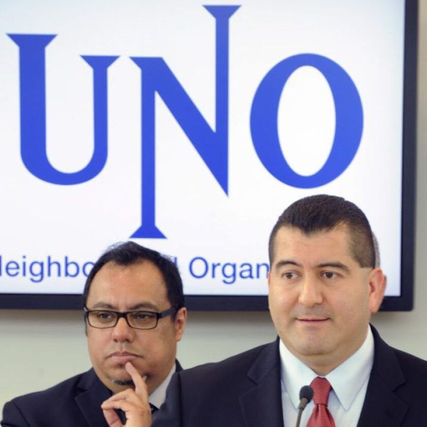 Martin Cabrera Jr. (right) at a May 28, 2013, news conference to announce he was stepping in to replace Juan Rangel (left) as chairman of the United Neighborhood Organization. | Sun-Times files