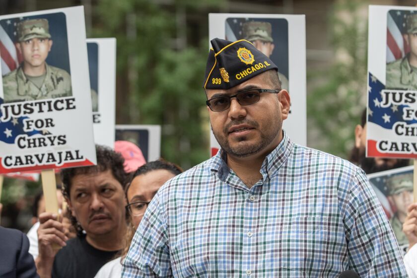 Chris Garibay, senior vice commander of American Legion Post 939, speaks during a protest on Aug. 13 demanding justice for murder victim Chrys Carvajal.