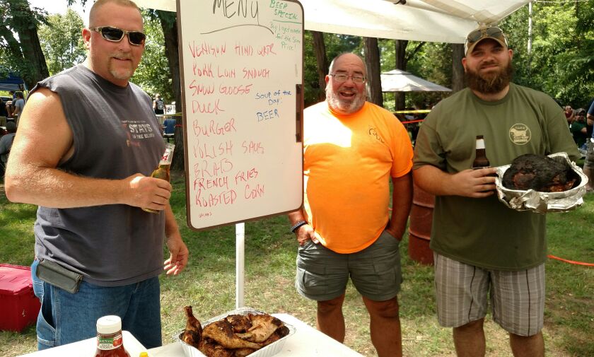 The cooks (l-r)–Bob Peters, Mike Mackey and Eric Lemcke–for the Autumn Harvest.<br>Credit: Dale Bowman