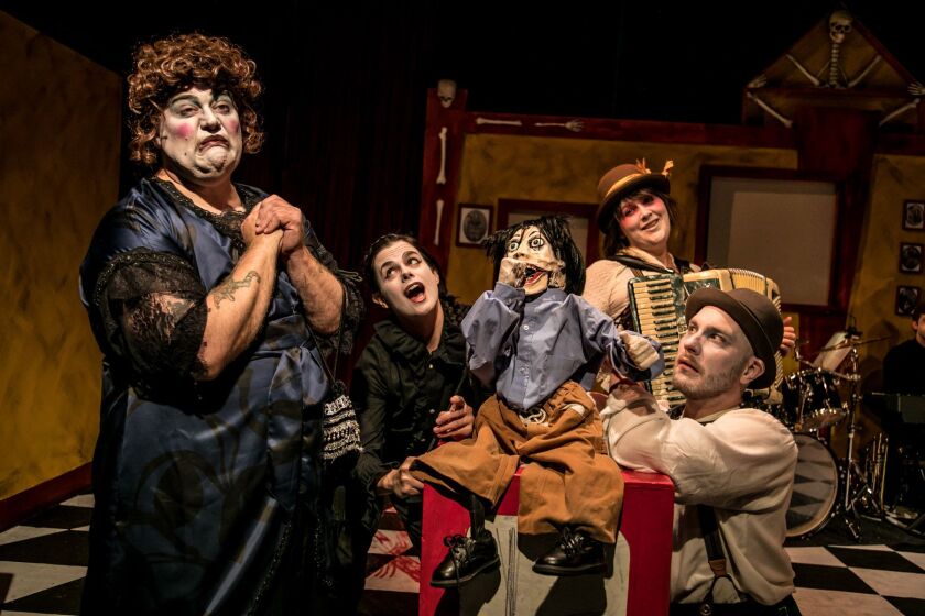 Anthony Whitaker (from left), Kat Evans, Gwen Tulin and Pavi Proczko in Black Button Eyes Productions’ “Shockheaded Peter.” (Photo: Cole Simon)