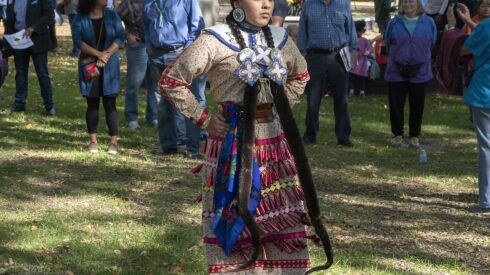 Maritza Garcia dances a traditional Jingle Dress Dance at a rally for Indigenous Peoples Day at Pottawatomie Park. Monday, October 10, 2022.