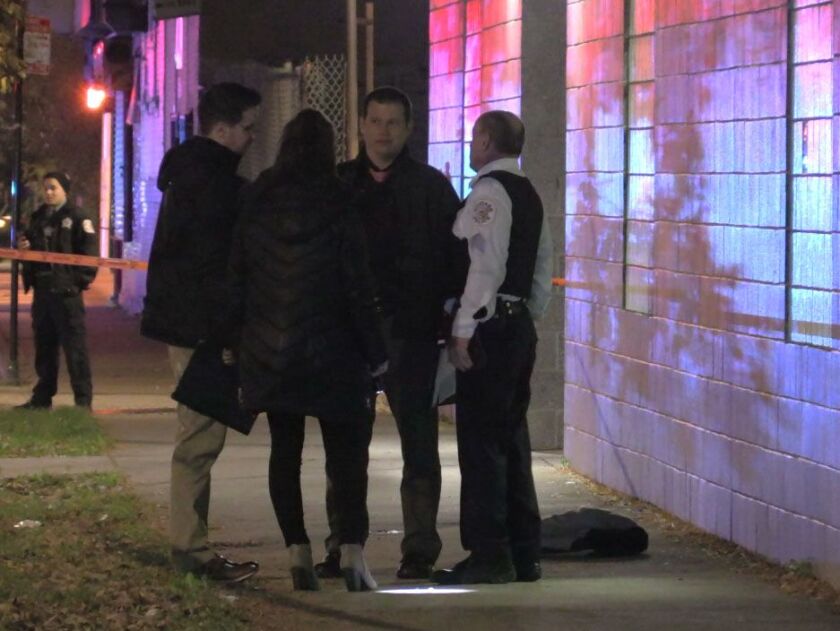 Police investigate a shooting about 11:30 p.m. Saturday, October 27, 2018 in the 0-100 block of North Karlov Avenue in Chicago. | Justin Jackson/ Sun-Times