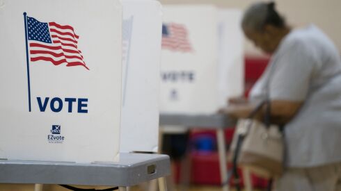 Voters go to the polls in Pontiac, Mich., during the Michigan primary on Aug. 2.