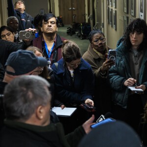 Resilience Healthcare CEO Manoj Prasad listens as Dr. Chidinma Osineme speaks to reporters Wednesday about conditions at West Suburban Medical Center in Oak Park.