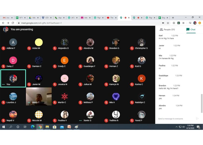 Students log on for their Google Meet video conference with Hubbard High School math teacher Jack Ng.