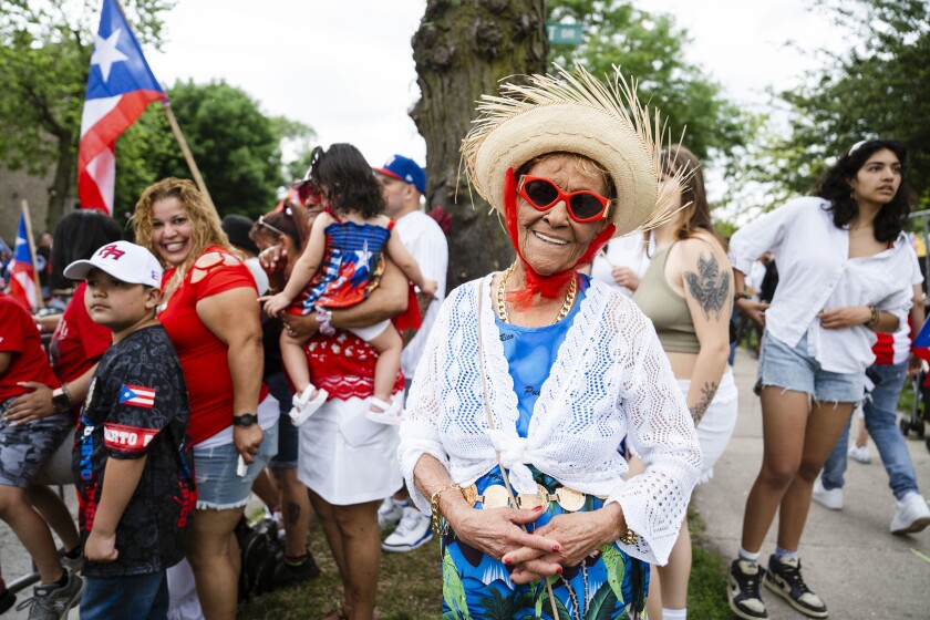 Josefina Morales smiles at the 2024 Puerto Rican People’s Day Parade in Humboldt Park, Chicago