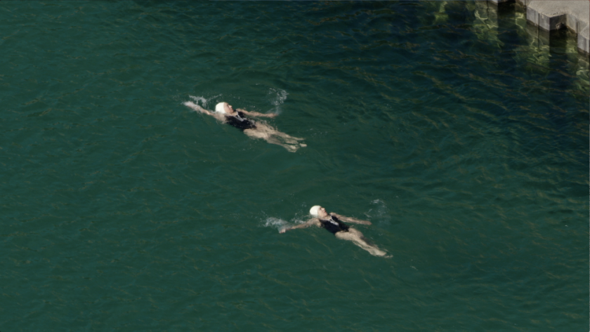 84-year-old twins Jennie and Julia Papilli do their daily swim in Lake Michigan in footage from “Aerial Cities.” | SMITHSONIAN CHANNEL