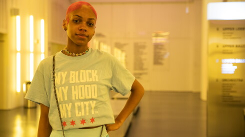 Downtown Day participant Del’Reona Cox poses for a photo at Harris Theater.