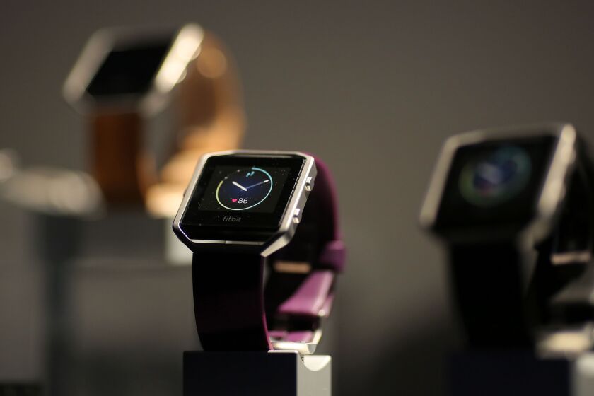 The FitBit Blaze | DAVID MCNEW/AFP/Getty Images