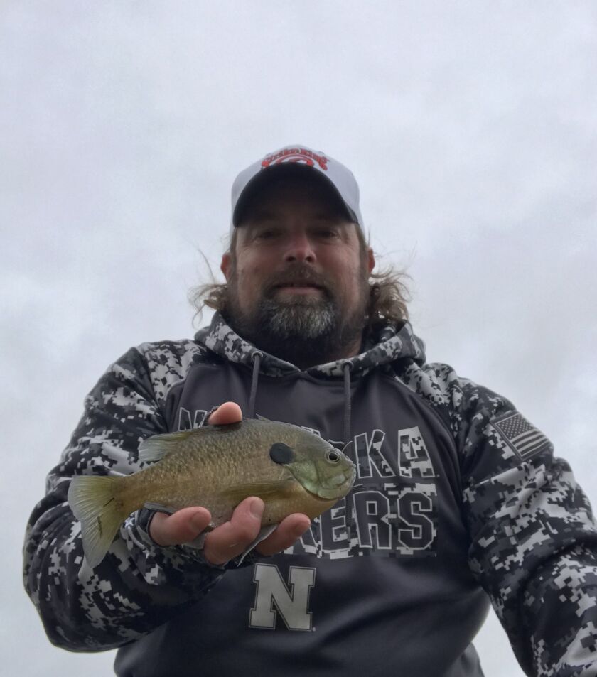 Ken “Husker” O’Malley with a bluegill caught pond fishing on the weekend. Provided photo