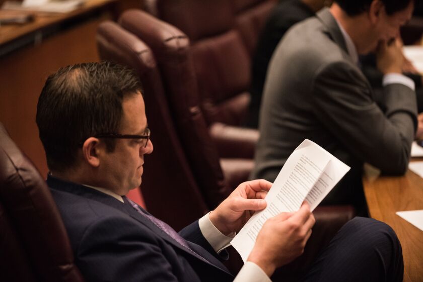 Ald. Joe Moreno (1st) looks over Mayor Rahm Emanuels annual budget address at City Hall on October 18, 2017. | Max Herman/For the Sun-Times