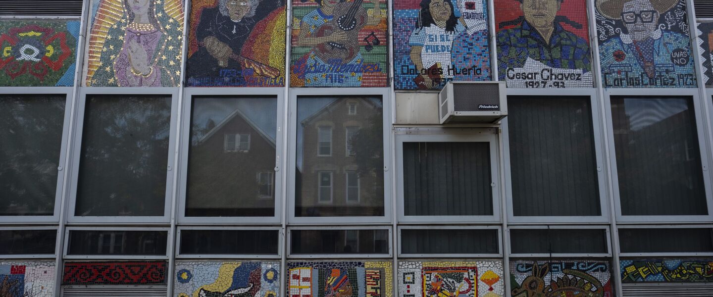 A mosaic of Mexican and Mexican-American icons and figures on the walls of a satellite building at Peter Cooper Elementary at 1645 W. 18th Place.