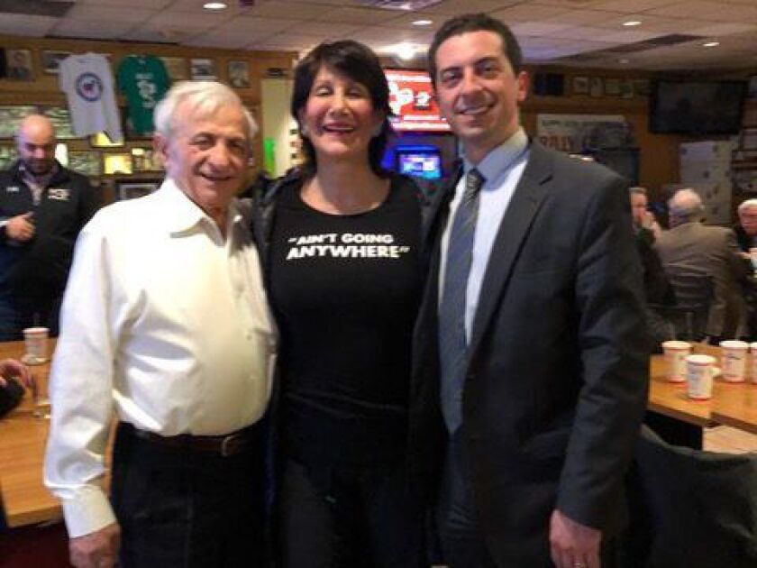 Cook County Treasurer Maria Pappas watches election returns with Billy Goat Tavern’s Sam Sianis, left, and his son, judicial candidate Tom Sianis, at the West Side watering hole in March. Provided Photo.