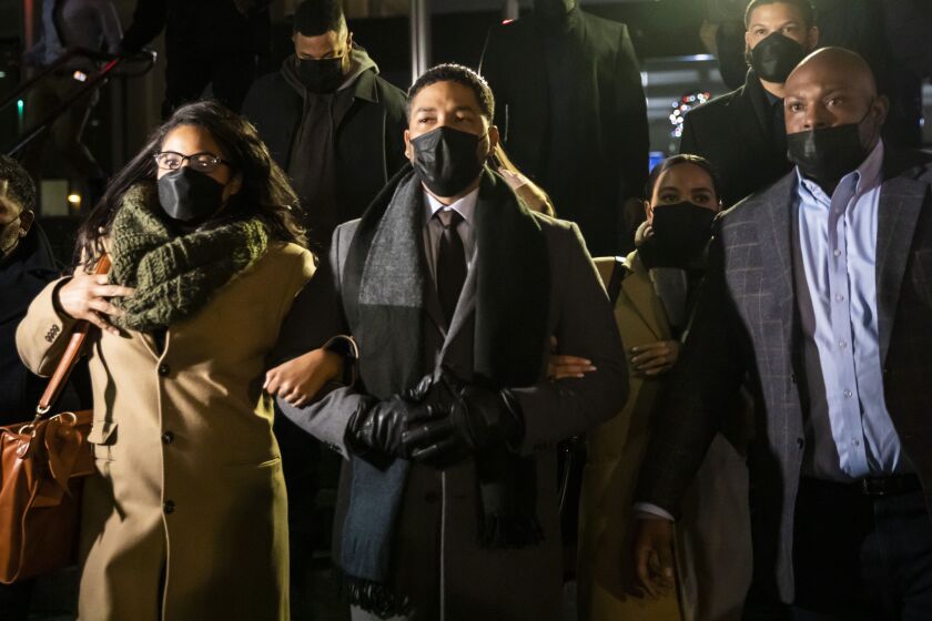 Flanked by family members, supporters, attorneys and bodyguards, former “Empire” star Jussie Smollett walks out of the Leighton Criminal Courthouse after he was found guilty on five counts of disorderly conduct but the jury acquitted him on one count, Thursday evening, Dec. 9, 2021. The 39-year-old actor and singer was charged with lying to Chicago police in 2019 when he claimed he was the victim of a racist and anti-gay attack near his Streeterville apartment.