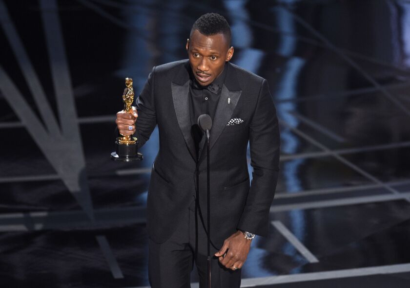 Mahershala Ali accepts the award for best actor in a supporting role for “Moonlight” at the Oscars on Sunday. | Chris Pizzello/Invision/AP