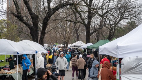Shoppers walk from stall to stall at the Green City Market in Lincoln Park on Saturday, April 4, 2026.