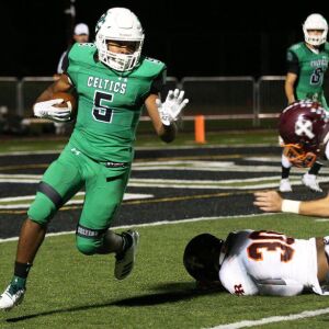 Providence’s Aaron Vaughn (5) carries the ball. Allen Cunningham/For the Sun-Times.