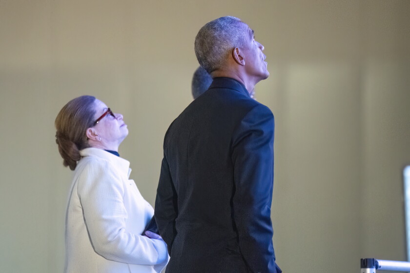 Former President Barack Obama along with Valerie Jarrett, CEO of the Obama Foundation get a closer look at the prototype of the ‘Power of Words’ at McCormick Place’s Hall D, Thursday, March 7, 2024. ‘Power Words’ will be a four-story media experience that’ll greet guests at the future Obama Presidential Center. | Tyler Pasciak LaRiviere/Sun-Times