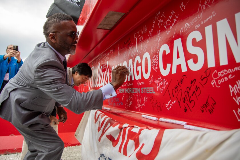 Mayor Brandon Johnson signs the final structural beam of the new Chicago Casino location on Thursday.