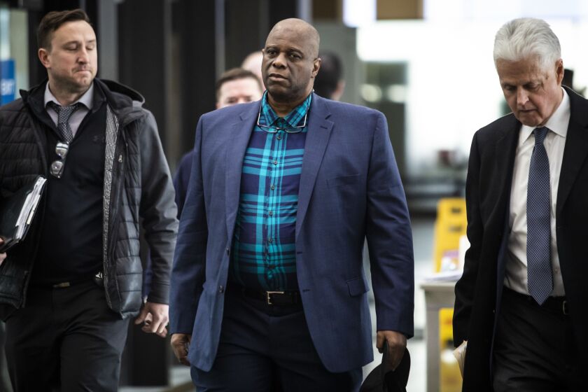 Chicago Police Officer Lowell Houser walks into the Leighton Criminal Courthouse on Friday morning, Dec. 20, 2019.